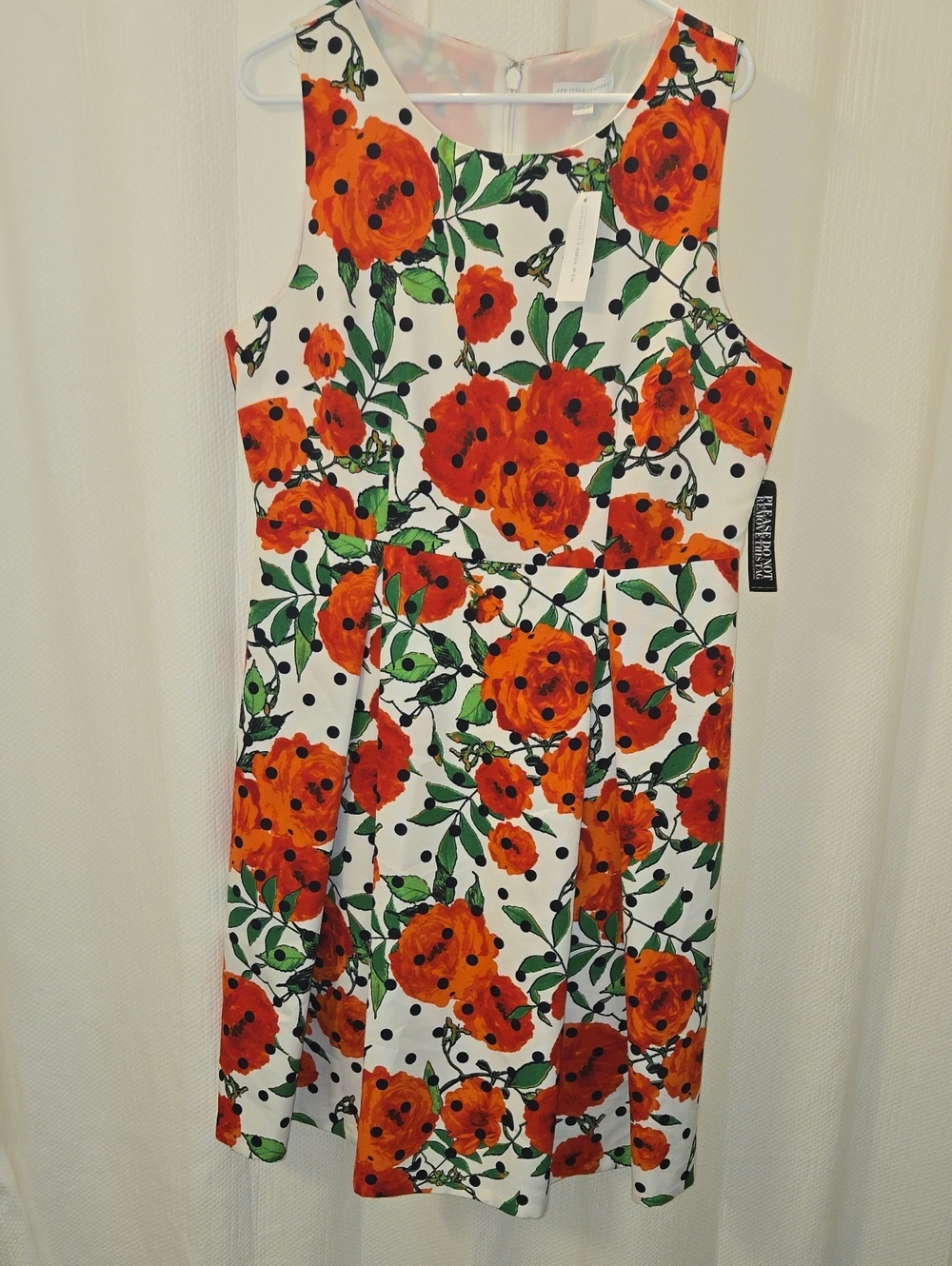 Size 14 Sleeveless White Dress with Red-Orange Floral Print
